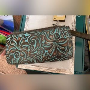 Tooled leather wristlet. NWT